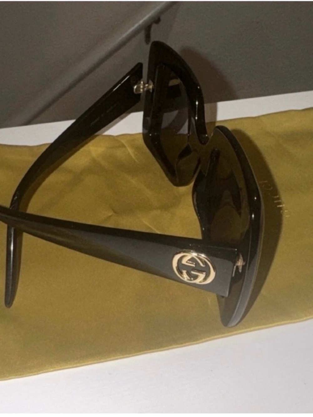 Gucci Black Cat-Eye Sunglasses with Gold GG Emblem